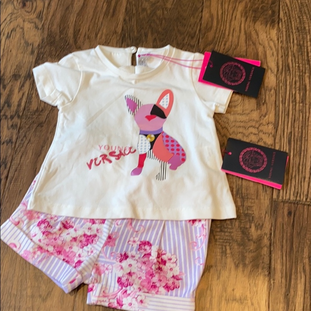 Versace baby outfit.